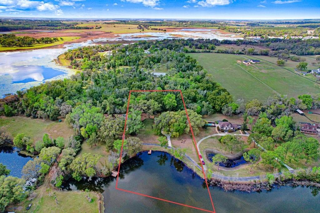 Property boundary lines in red are approximate