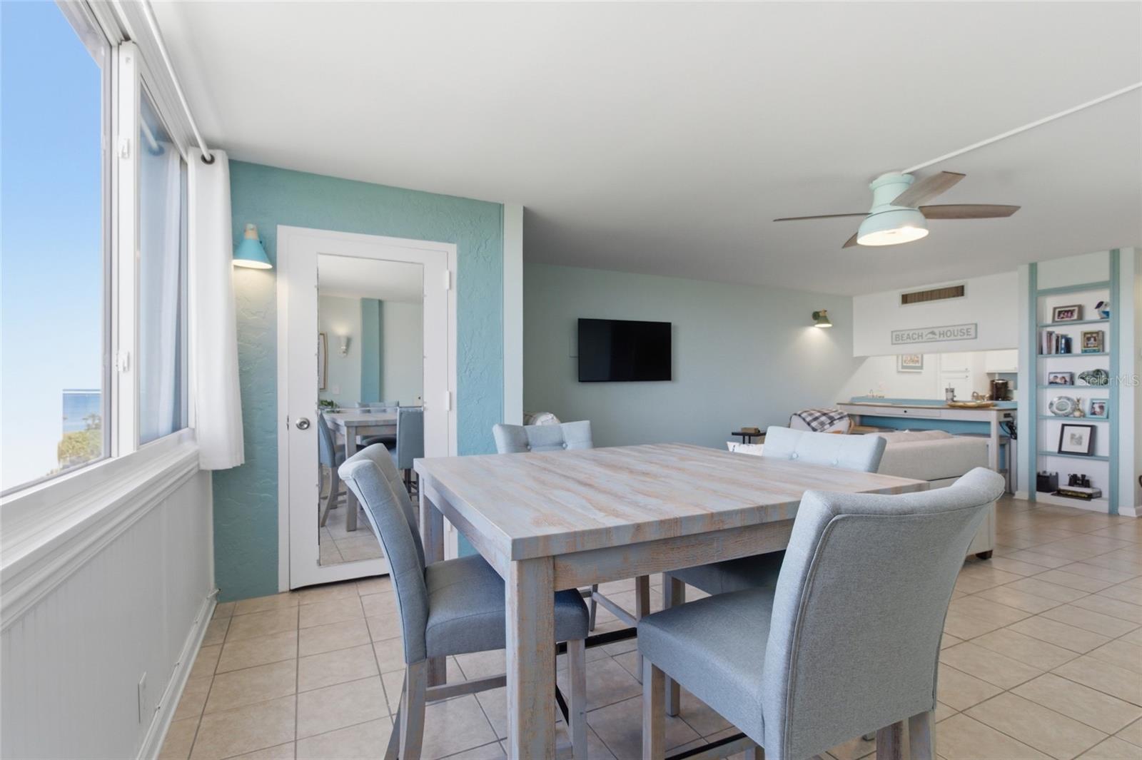 Dining area with large walkin laundry and storage closet