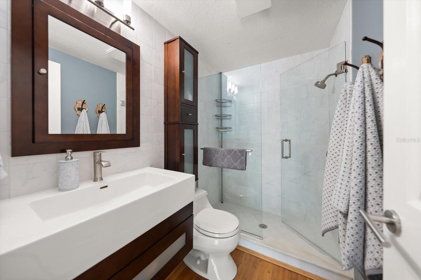 Primary bathroom with walk in shower.