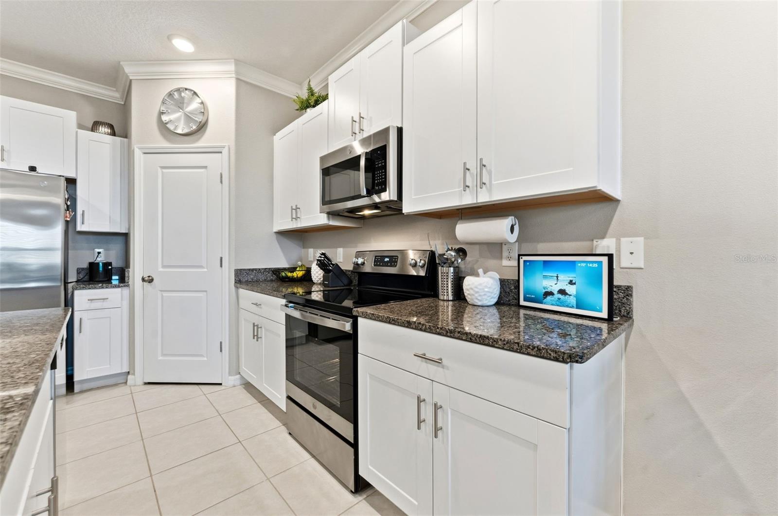 Beautiful Kitchen With Walk In Pantry & Stainless Steel Appliances