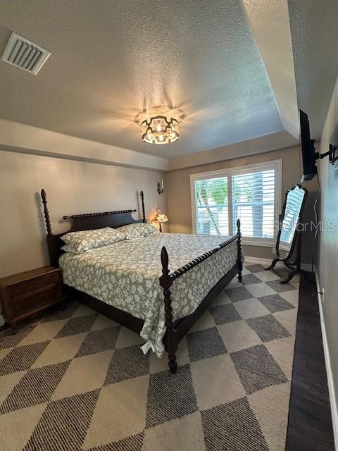 Primary bedroom with plantation shutters