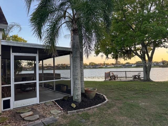 View of back lake and yard.