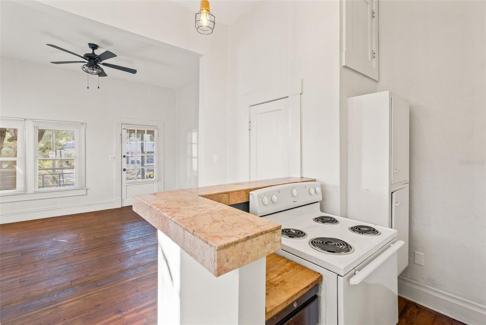 Kitchen looking into living room