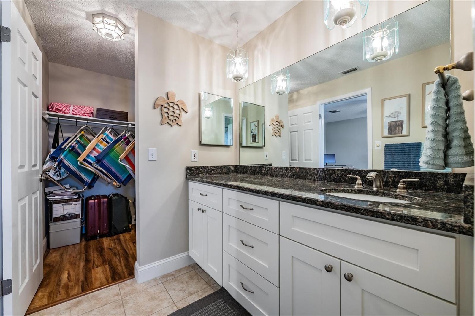 walk in closet just off master bath this is the area you can add a washer dryer in one unit system with approval through association