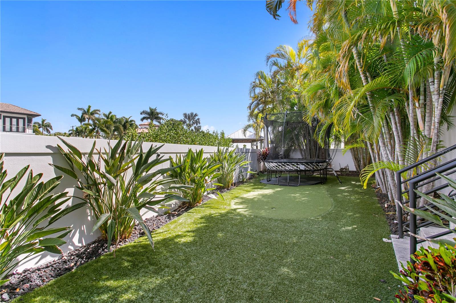 Putting Green & Trampoline Area