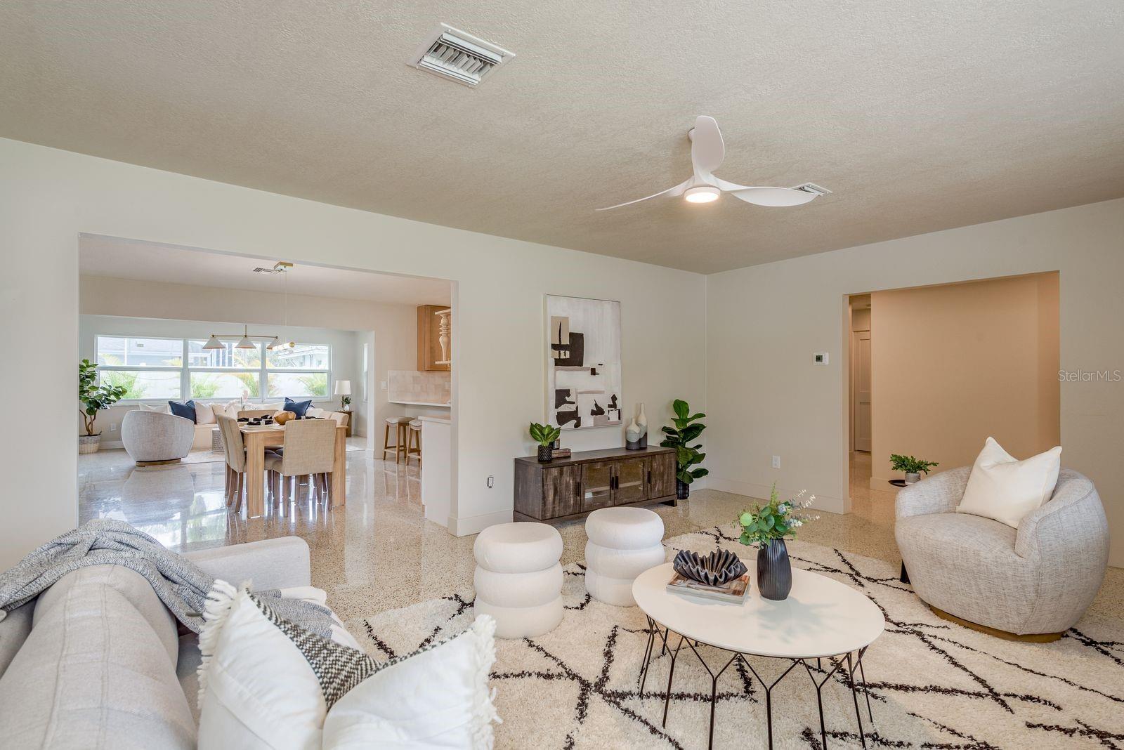 Living room opens to dining room, bonus family room and kitchen. Open Floor plan