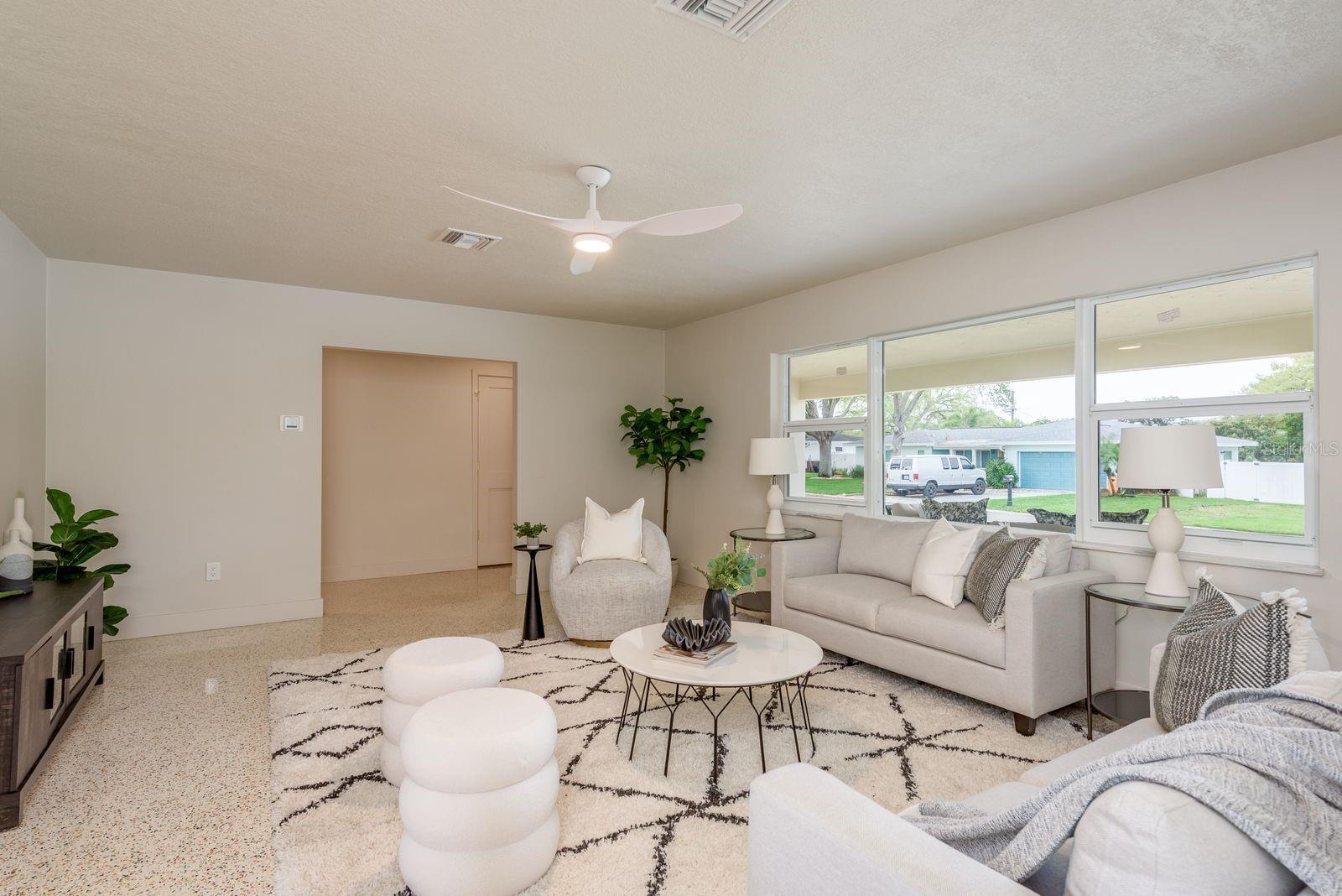 Living room towards entry and foyer