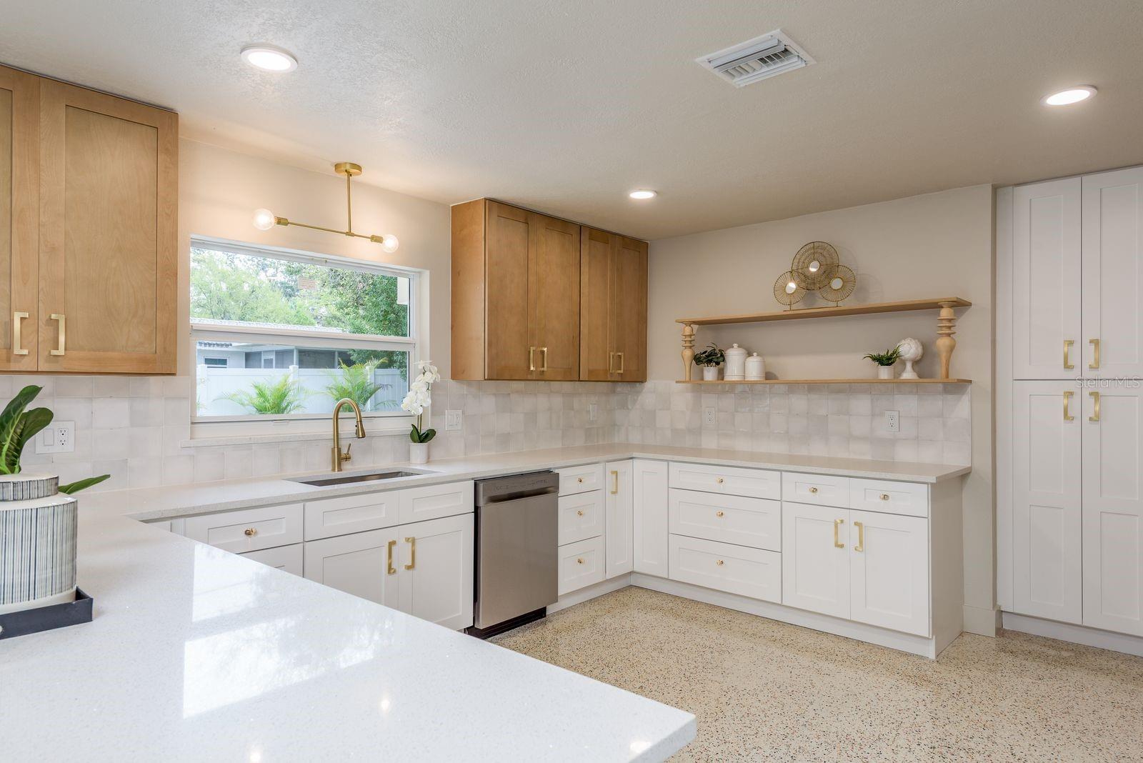 Open kitchen, coffee bar, plenty of room for mixers and appliances, soft close all wood cabinetry