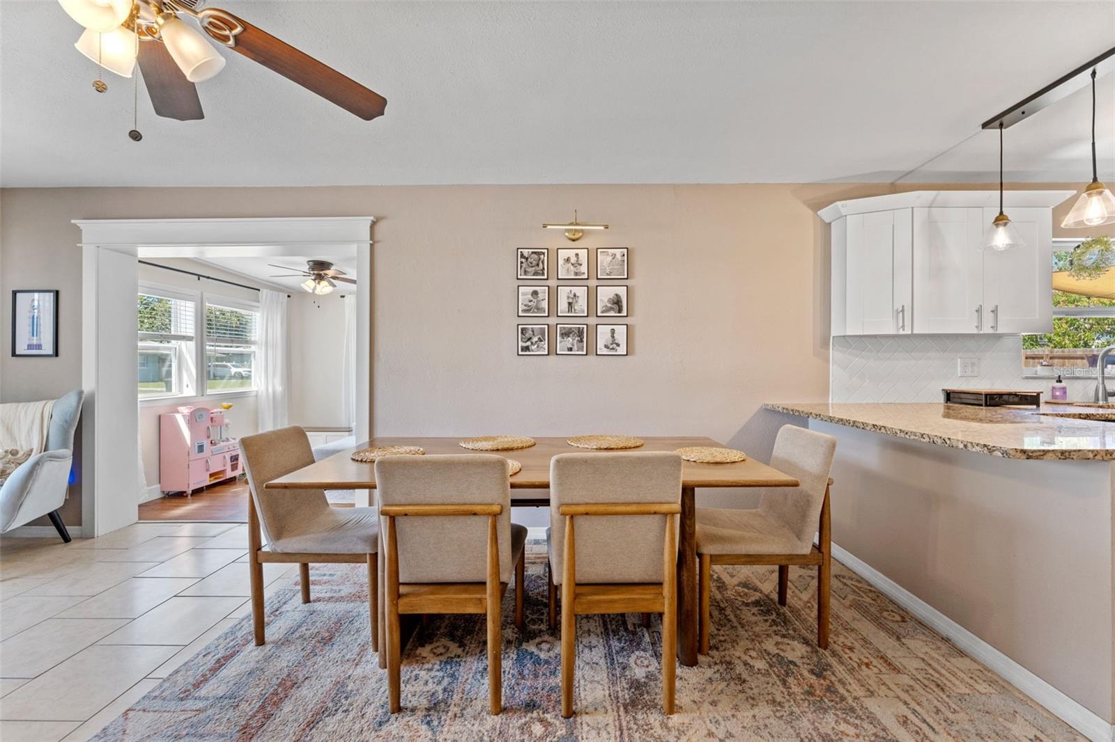 Dining room designed for comfort and effortless flow to the kitchen.