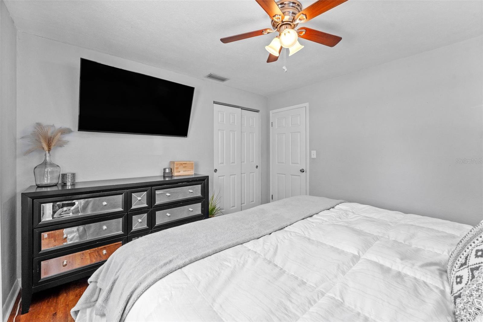 Primary bedroom with room to unwind, filled with natural light and a peaceful vibe.