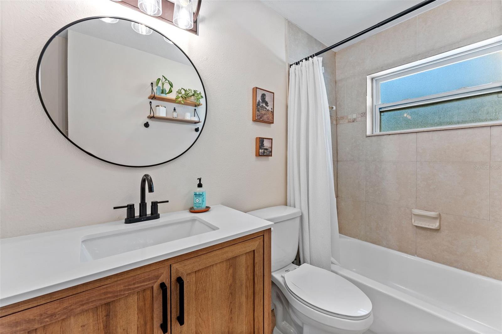 Stylishly designed hall bathroom with tasteful finishes and a modern feel.