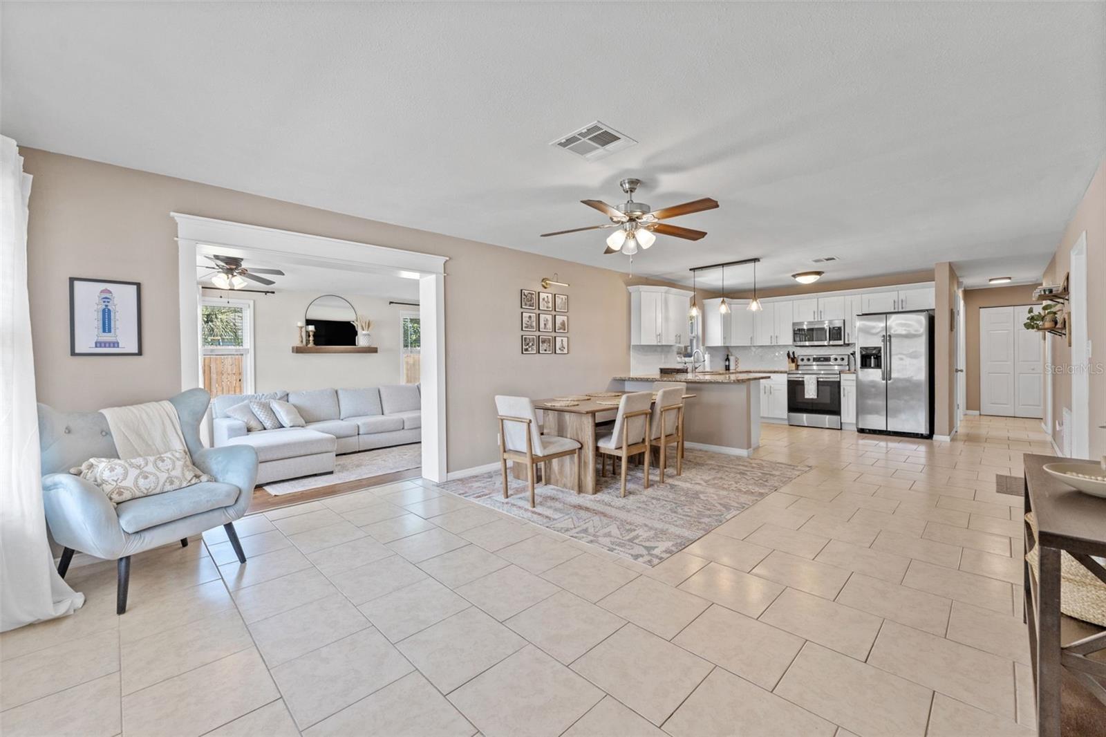 The home opens to a large, flowing living space that creates a comfortable environment for entertaining and everyday living.