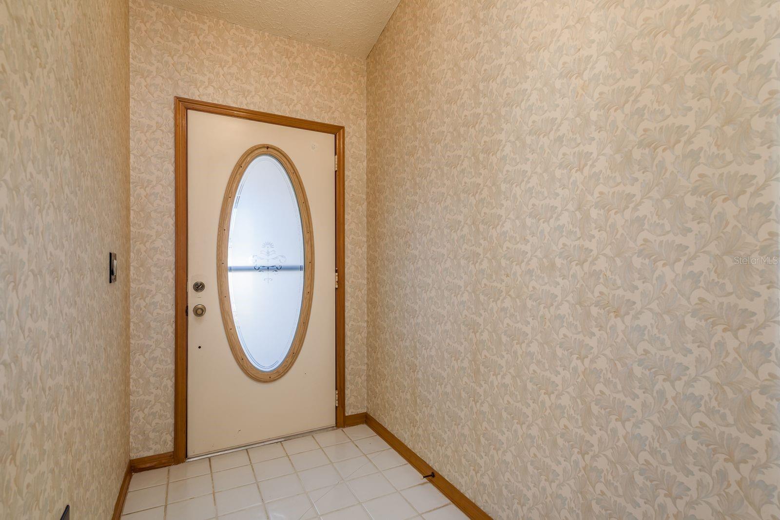 Foyer with High Ceilings