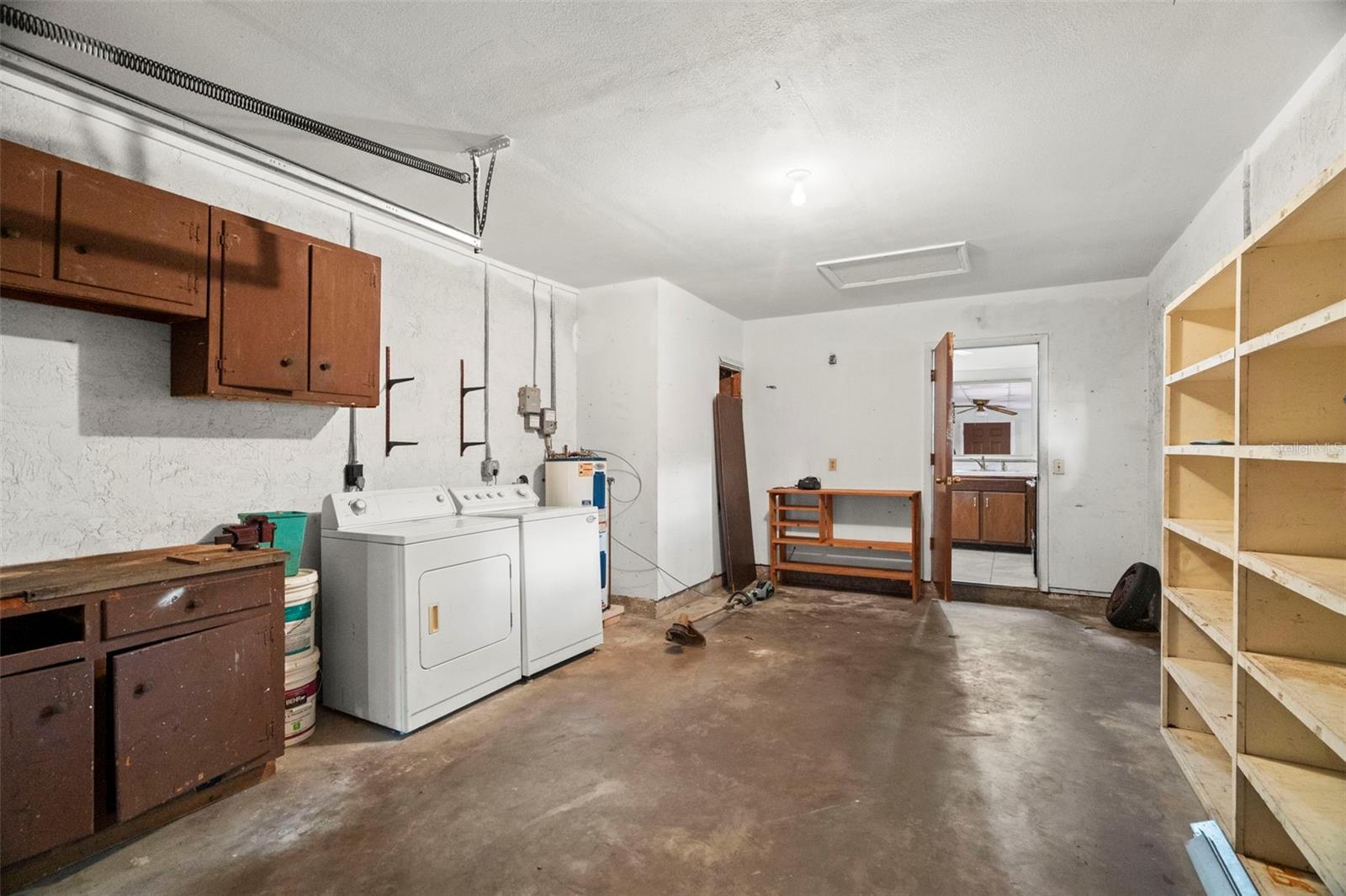 Garage with washer/dryer hook-ups.