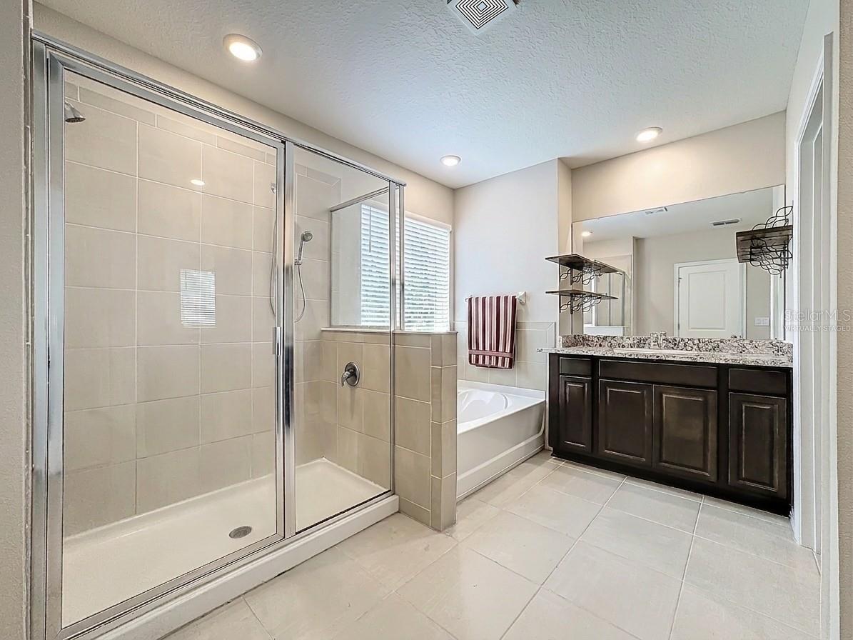Virtually Staged with Towels. Primary Bathroom