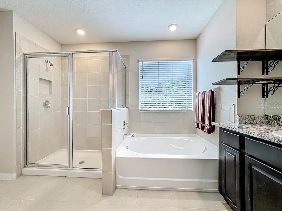 Virtually Staged with Towels. Primary Bathroom