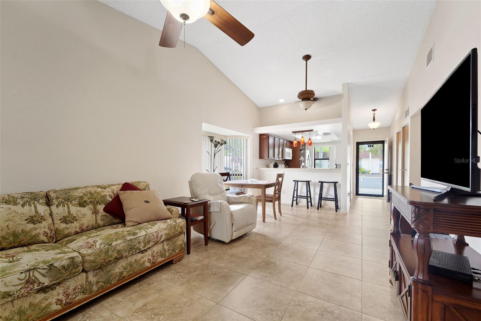 Living Room looking toward kitchen and front door
