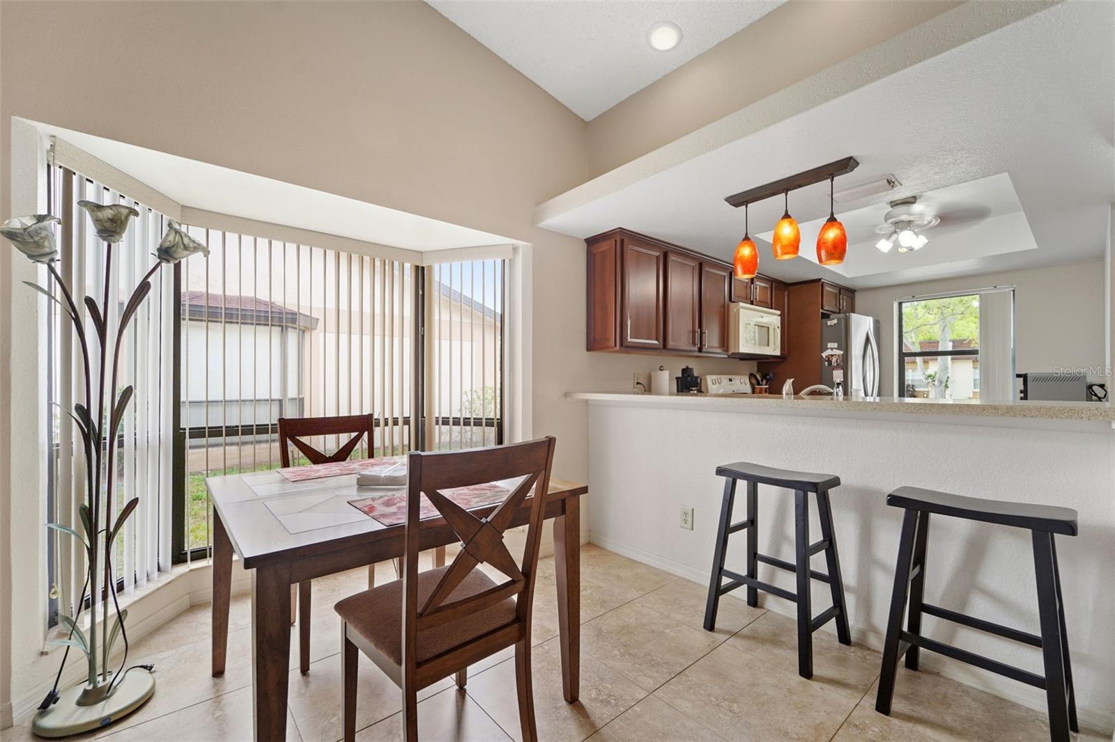 Dining space looking into kitchen