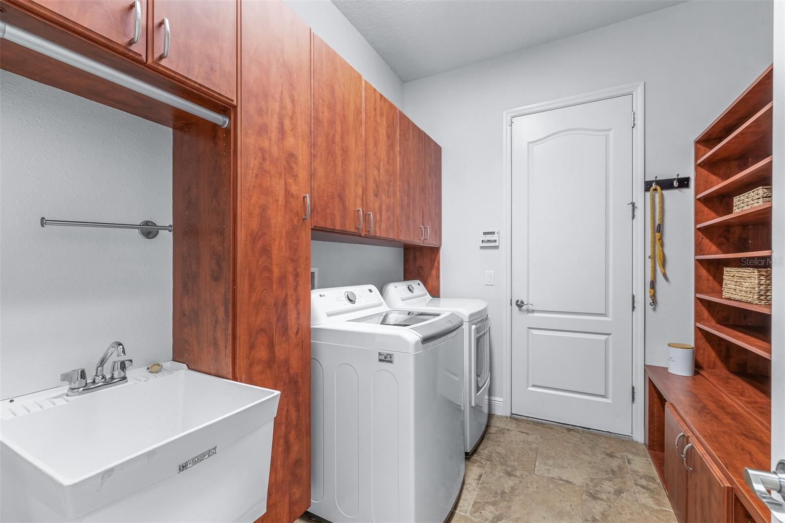 Laundry Room with Utility Sink and Built-in Mudroom