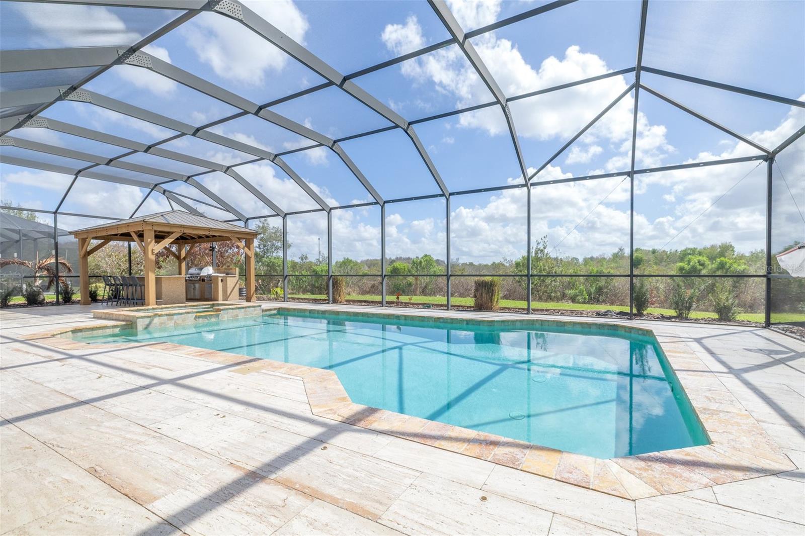 Crystal-clear Pool and Spa Overlooking Serene Conservation View