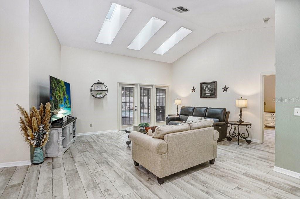 Enter into Living Room and Formal Dining Room