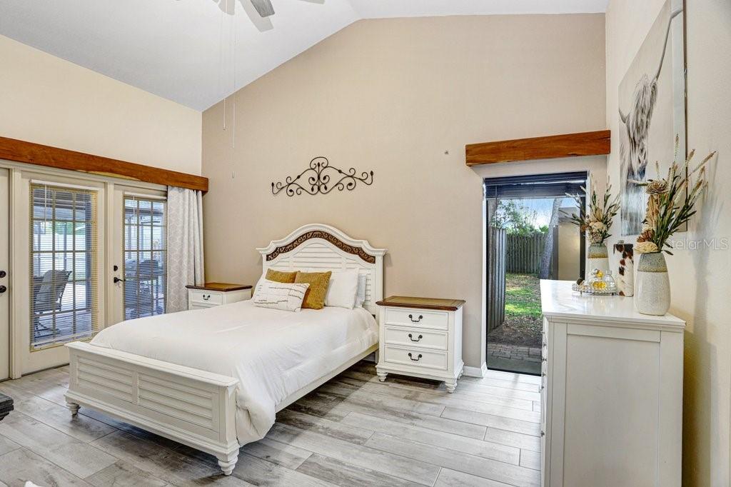 Primary Suit with French doors to lanai and private patio