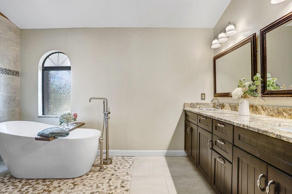 Primary Bathroom has free standing tub and double vanity