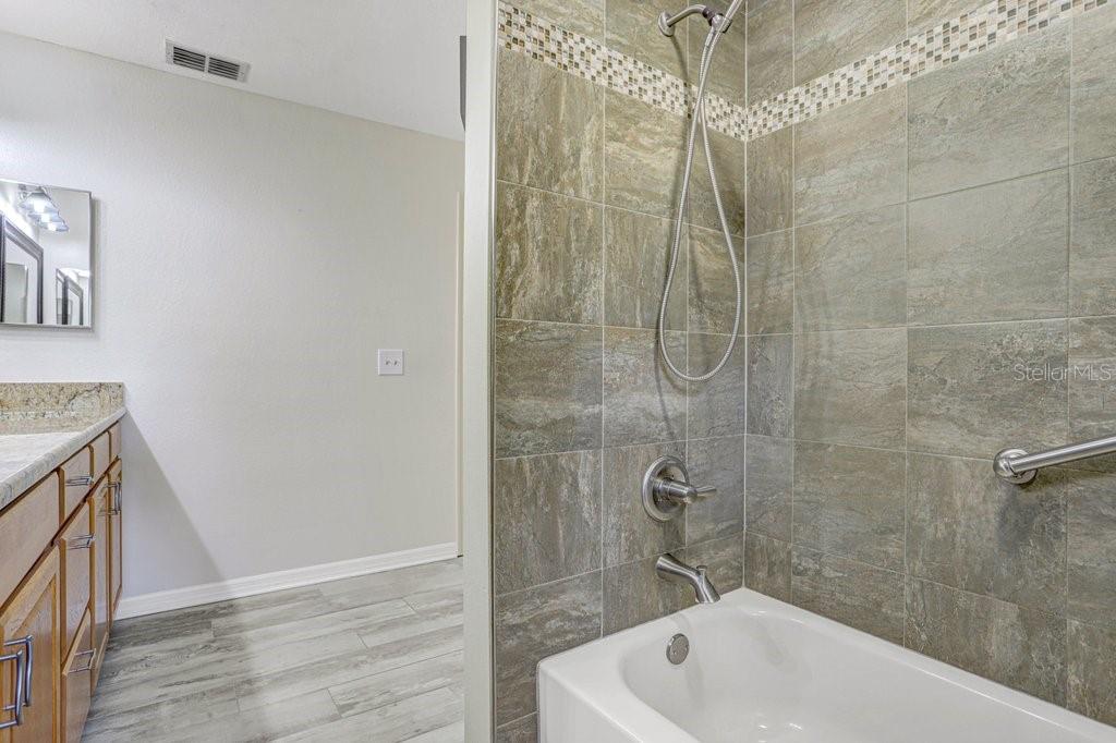 Updates done with double vanity and shower/tub combo