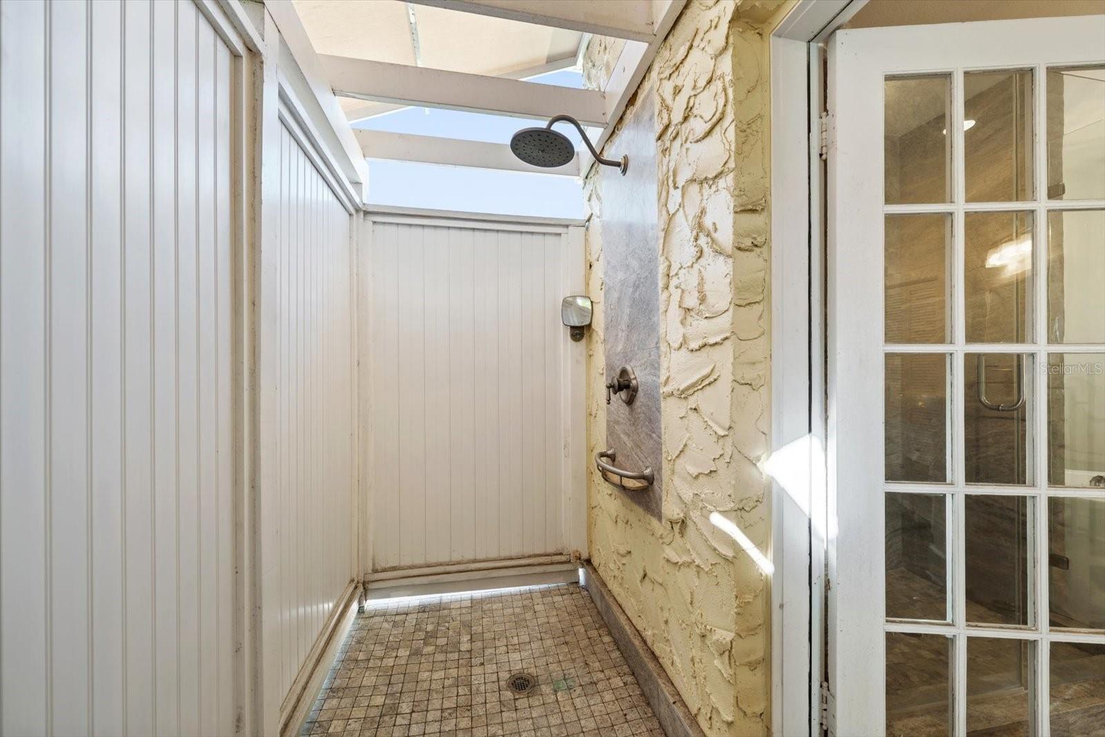 Outdoor shower off primary bath