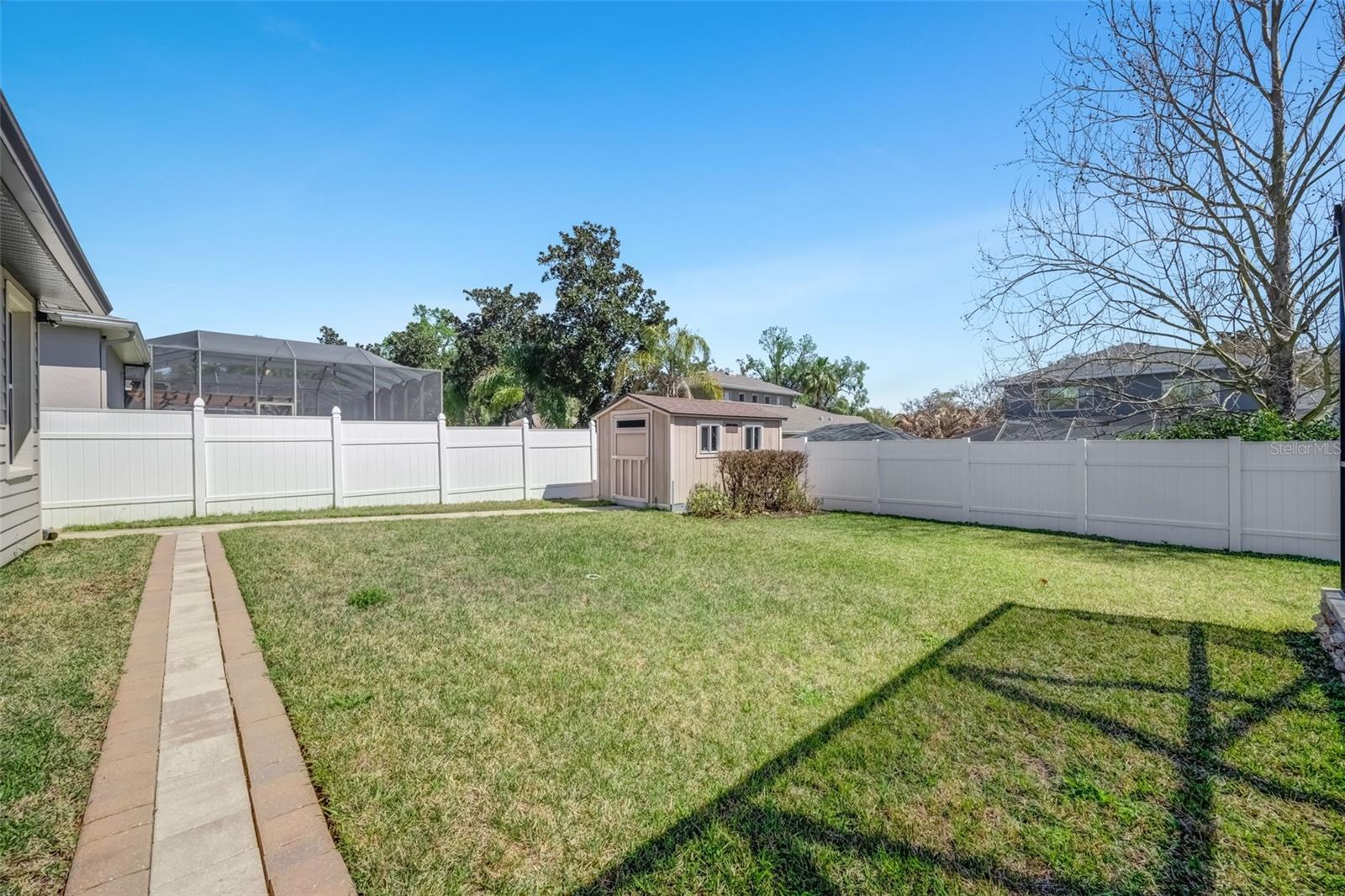 Paved walkway to Shed