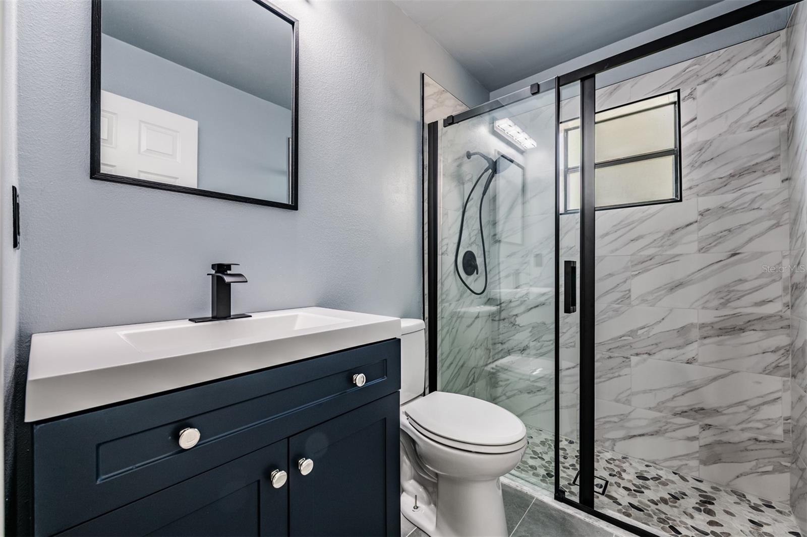 Guest Bathroom - Pool Bathroom completely updated by the 3rd bedroom.