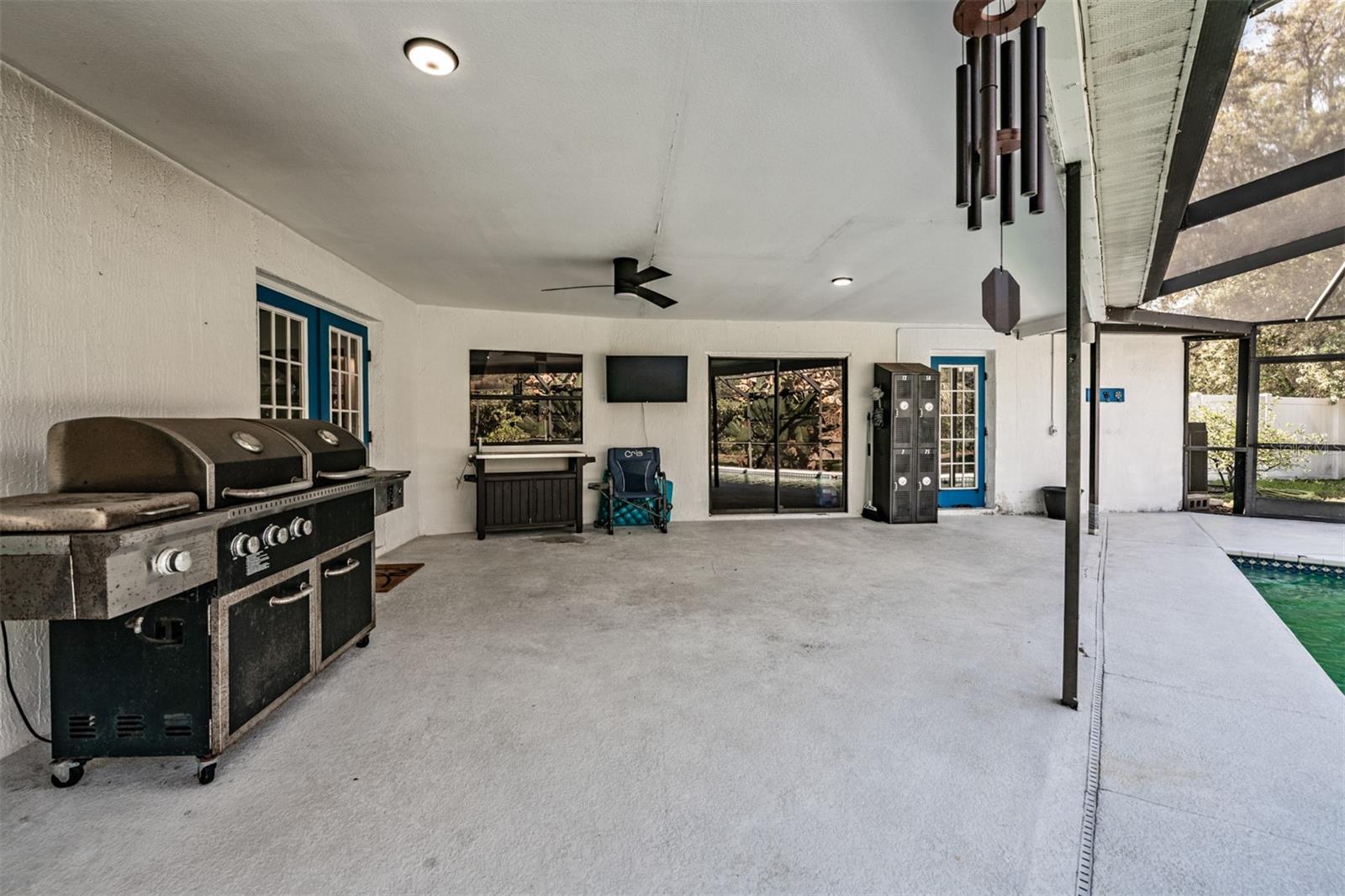 Plenty of covered space by the pool for entertaining!