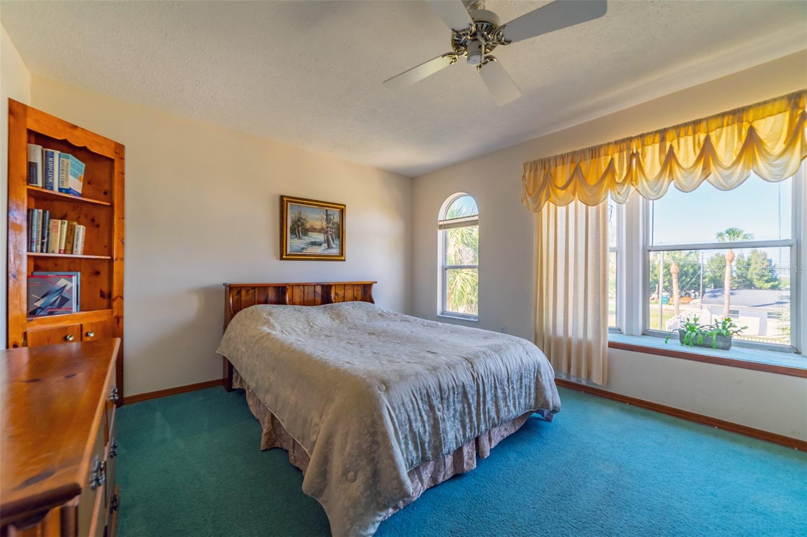 GUEST BEDROOM WITH LARGE BAY WINDOW