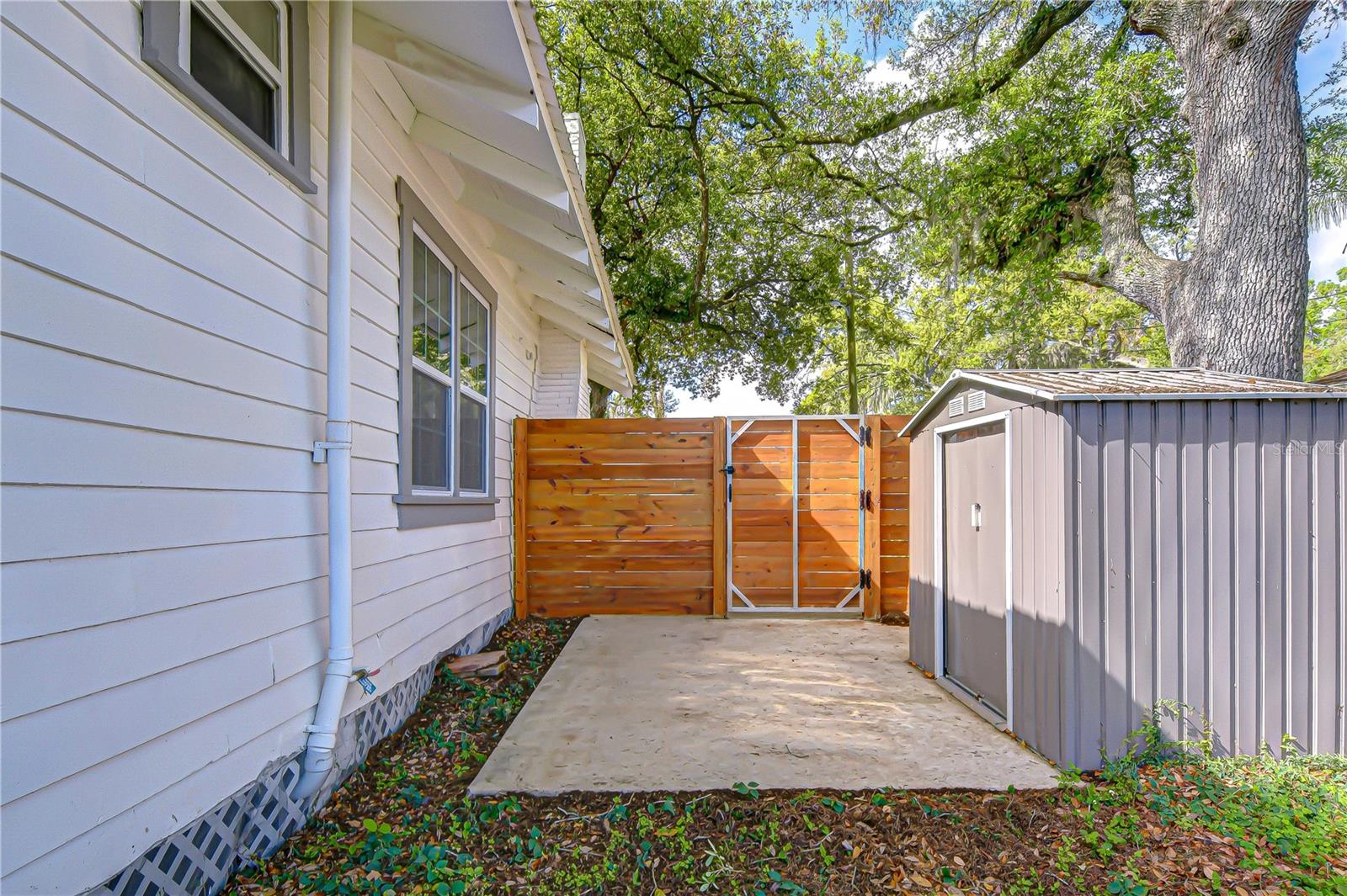 Outdoor storage shed perfect for tools and equipment.
