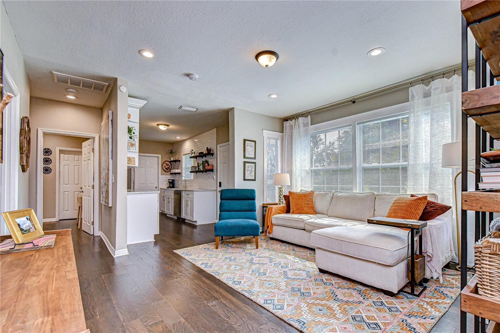 Bright and comfortable living space with a layout that flows seamlessly throughout the home.