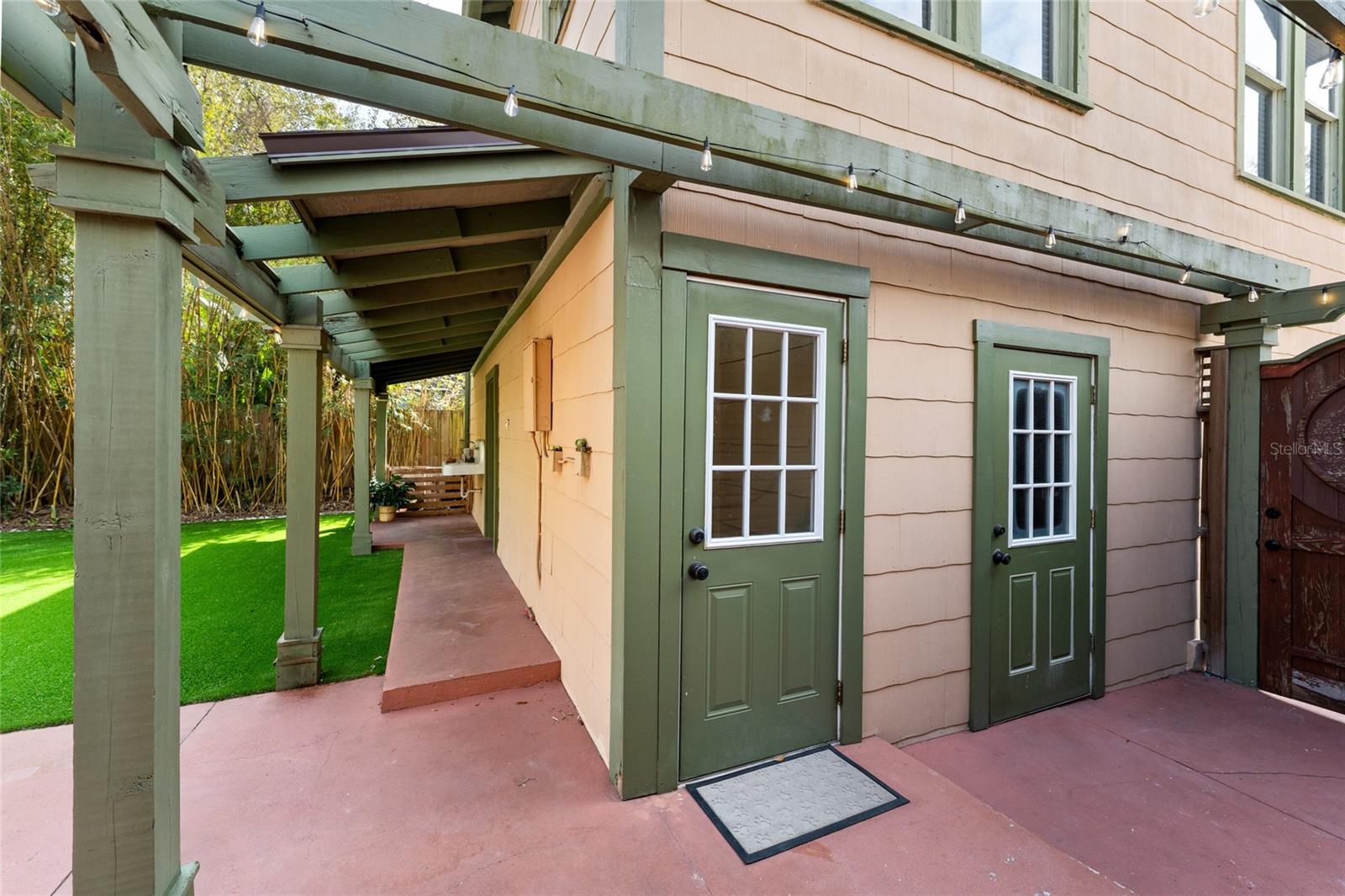 Entry to garage, ADU & pool bath.