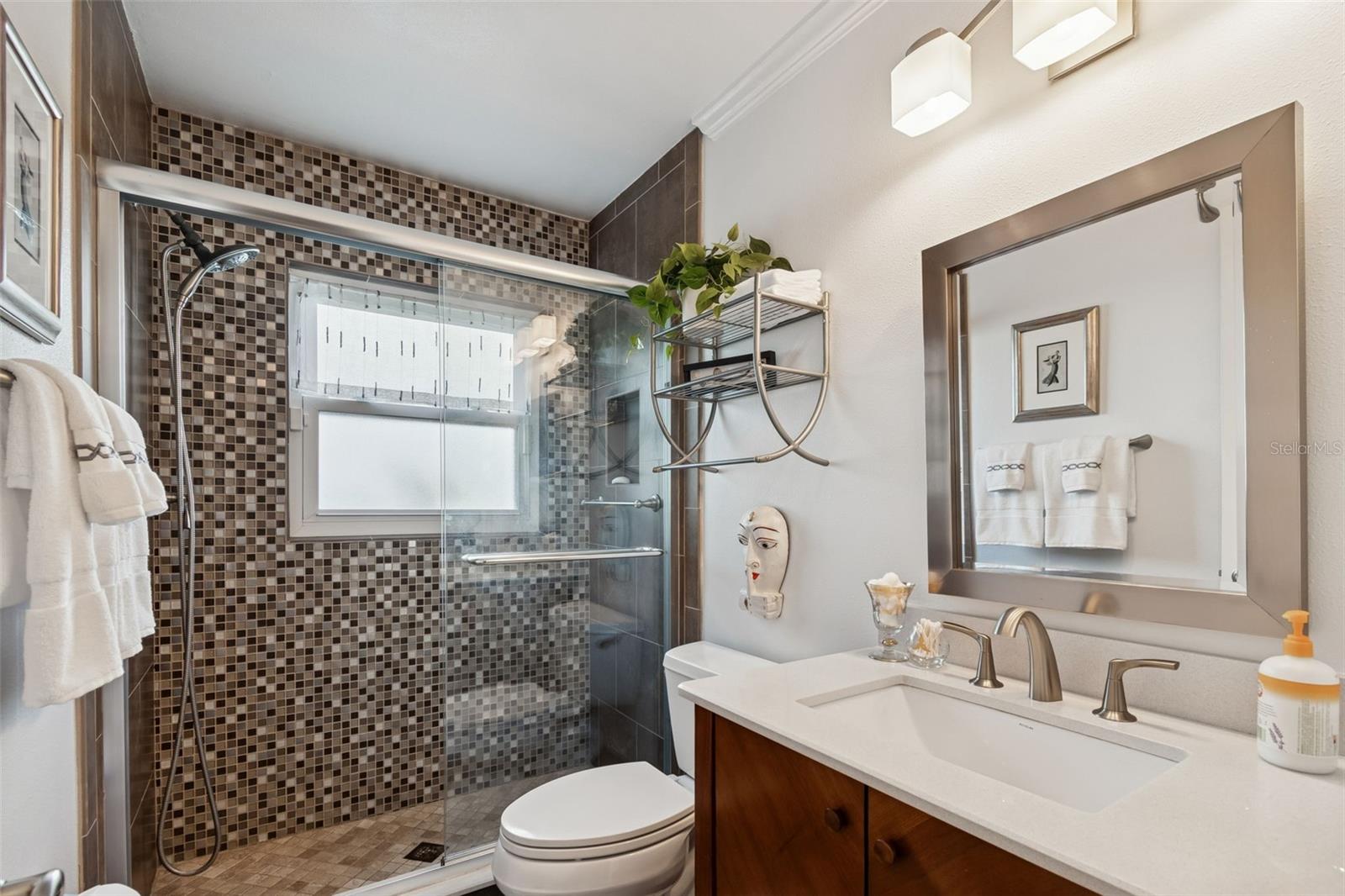 Bathroom with Ceiling to Floor Tiled Shower