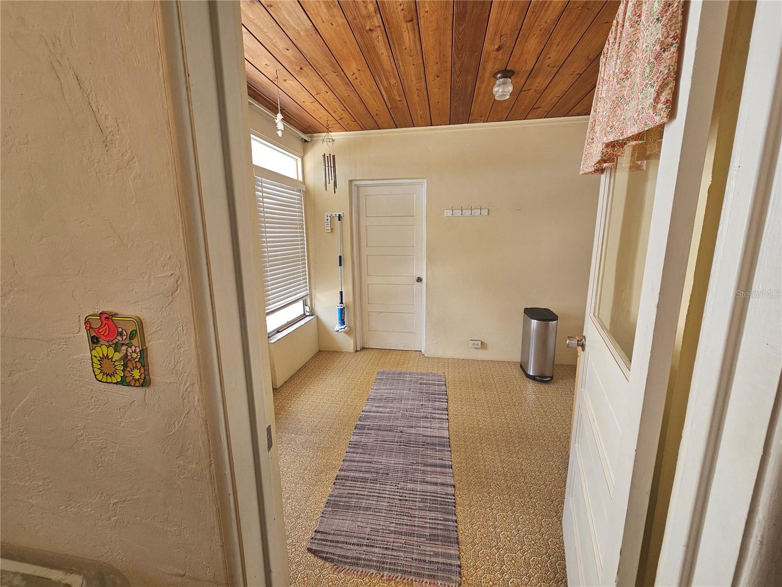 Florida room connects the house and garage