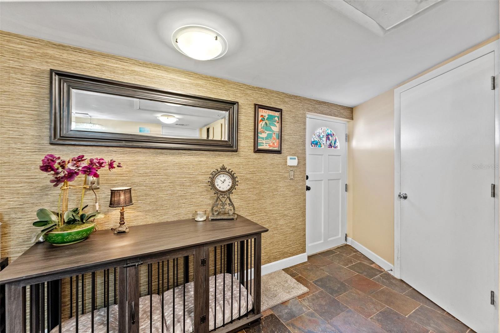 Extra entrance off of the carport