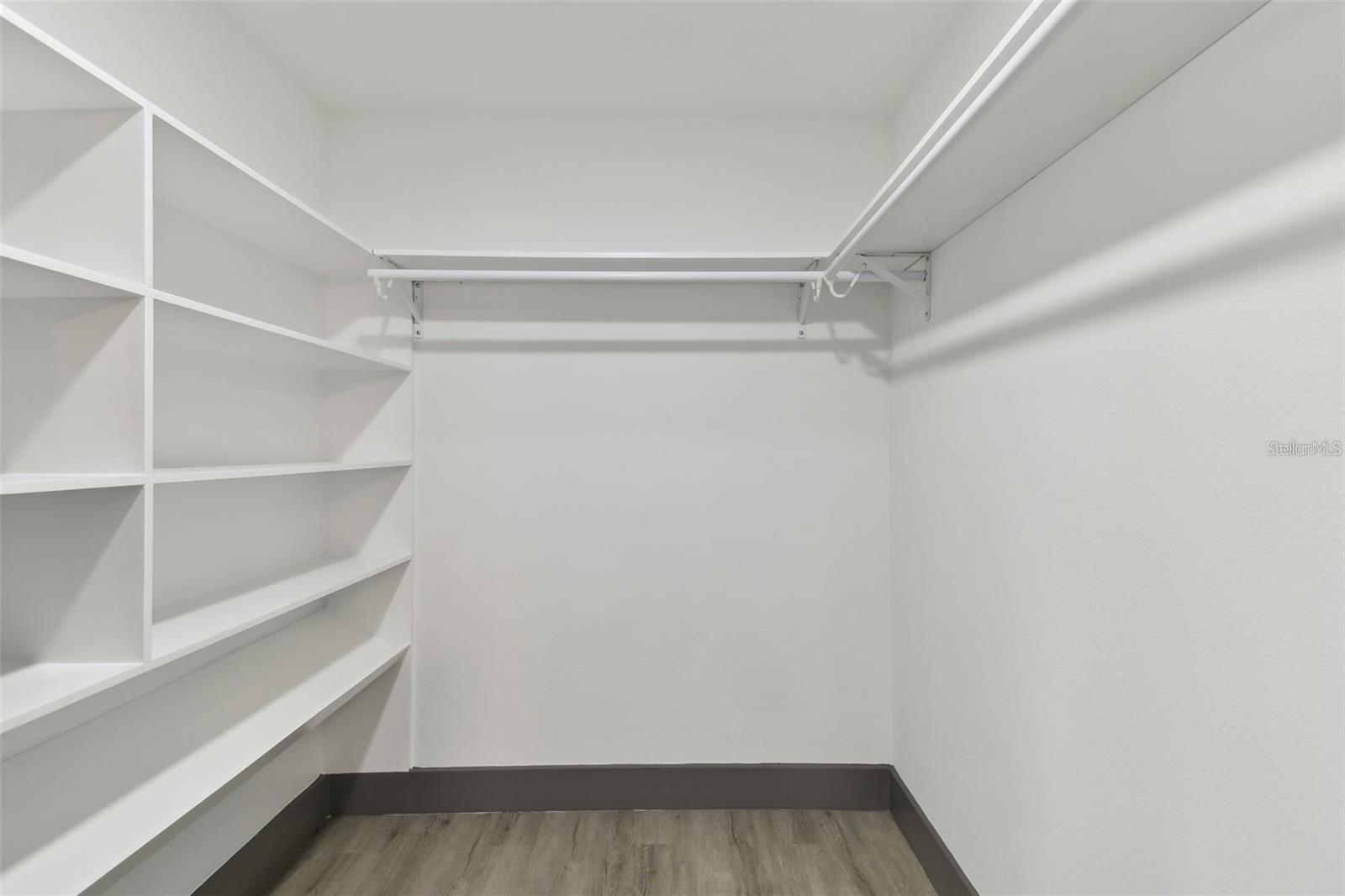 PRIMARY BEDRM WALK-IN CLOSET
