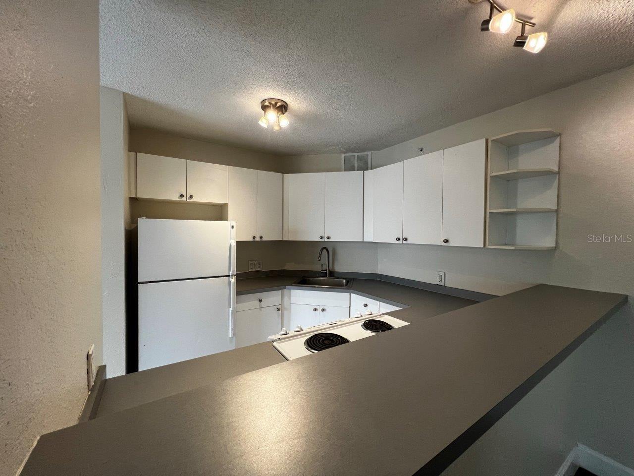 Open kitchen with breakfast bar