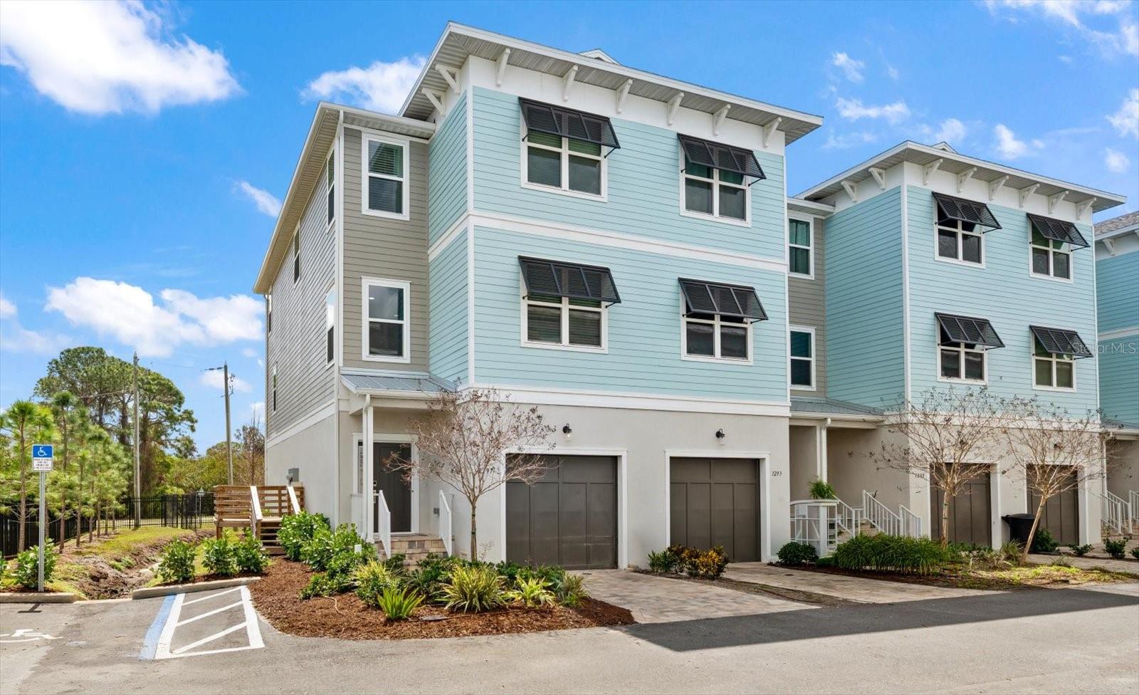 Only unit with the rear of the home overlooking lush green foliage, much of it protected as part of the scenic Weedon Island Preserve, providing a serene natural backdrop.