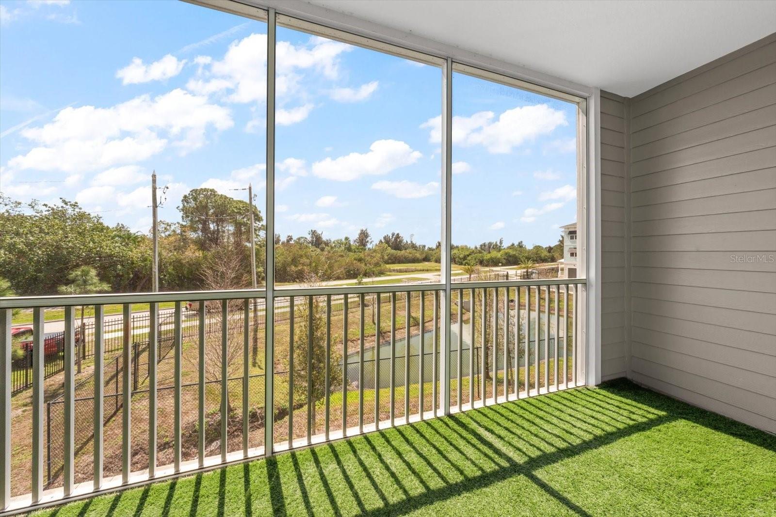 Only unit with the rear of the home overlooking lush green foliage, much of it protected as part of the scenic Weedon Island Preserve, providing a serene natural backdrop.