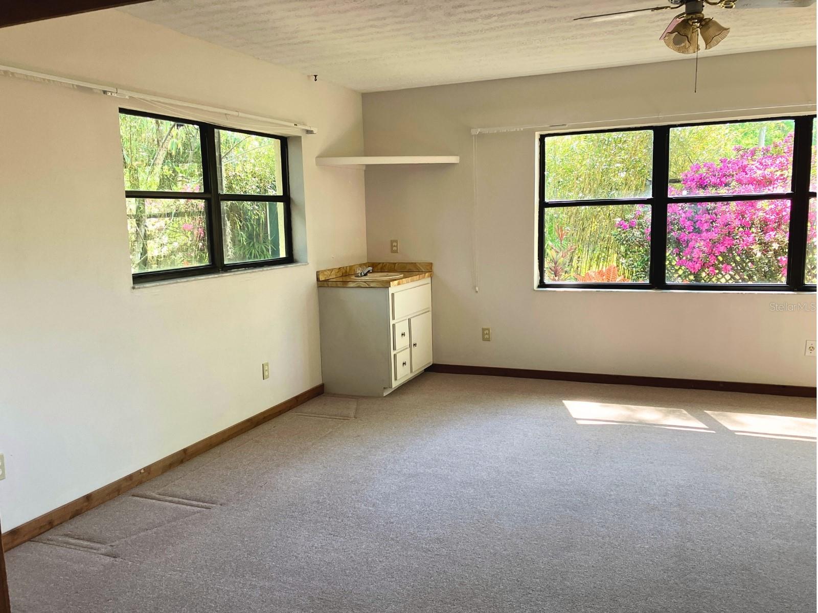 Florida room has water access with an installed sink.