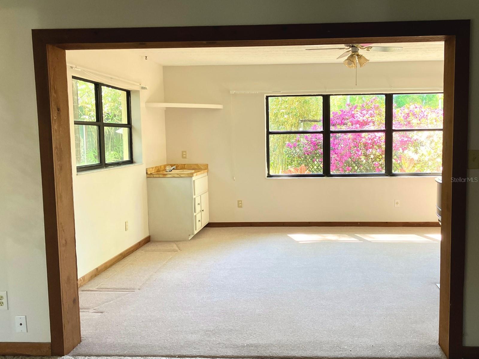 Living room/Kitchen area flows to Florida room