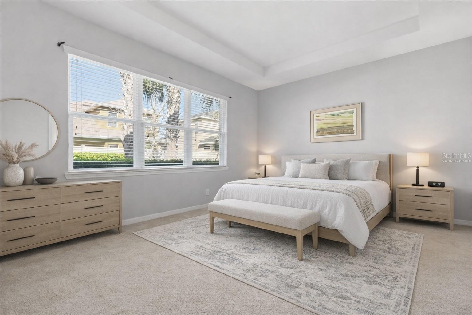 Primary bedroom with tray ceilings -Virtually Staged