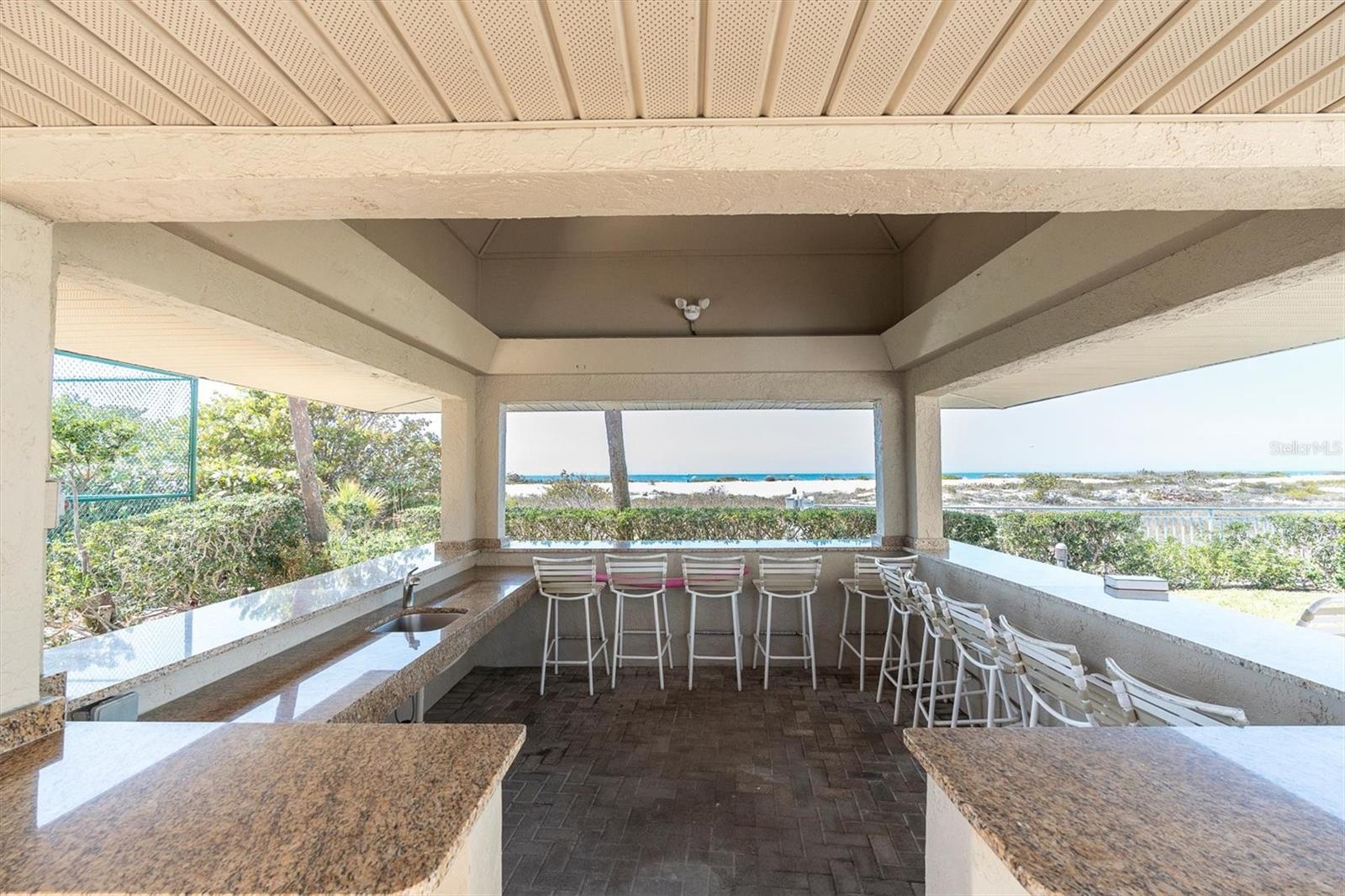Covered bar area by pool