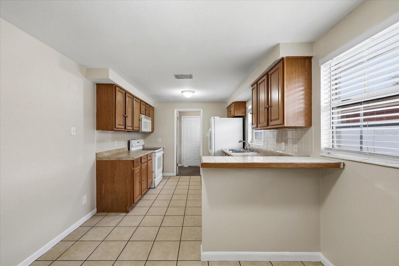 Kitchen with Breakfast Bar & Eat In Area
