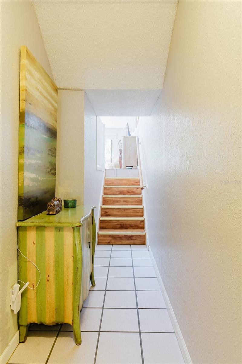 Foyer with Title Floors View of Stairs to the Main Level