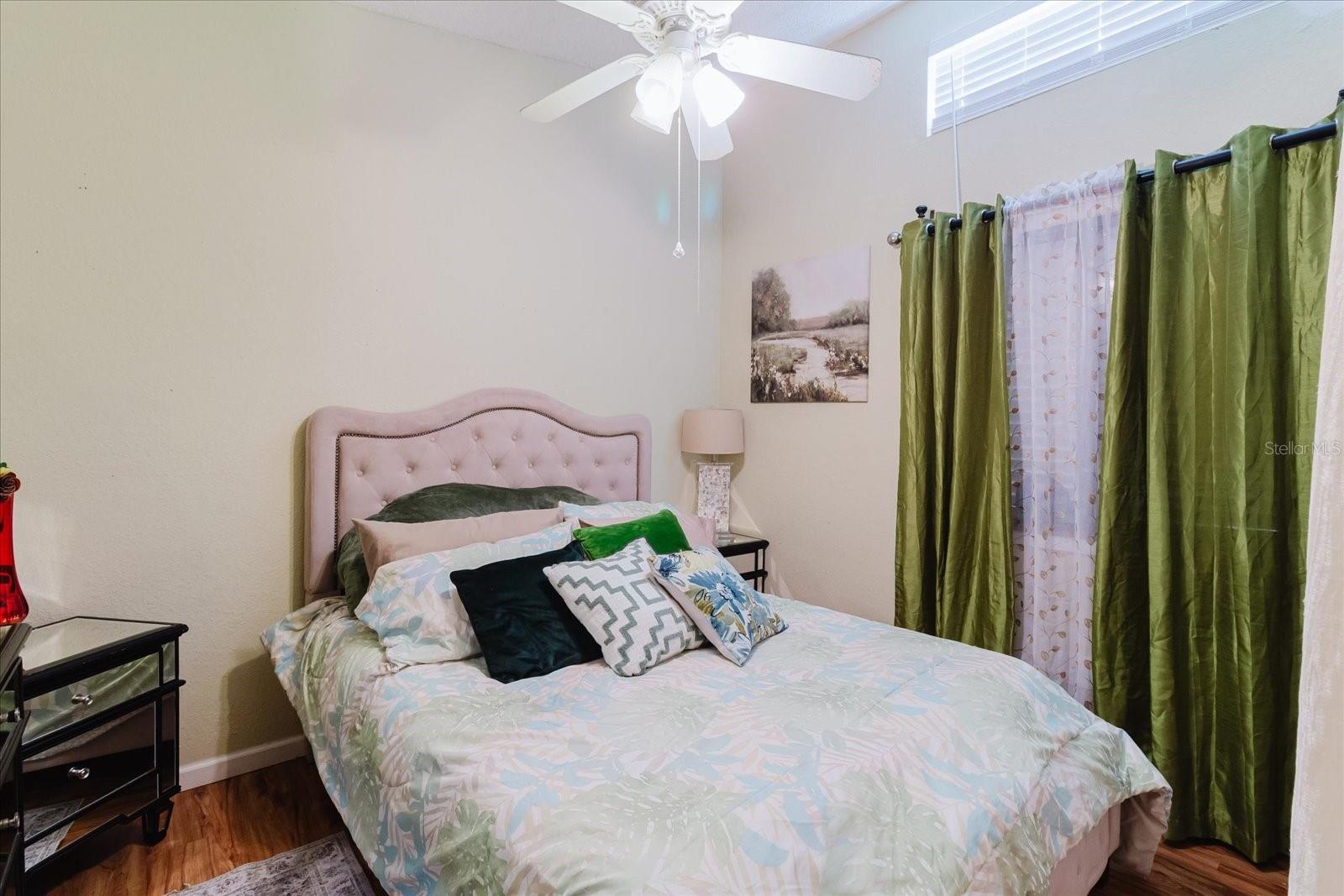 Secondary bedroom With Luxury Vinyl Flooring